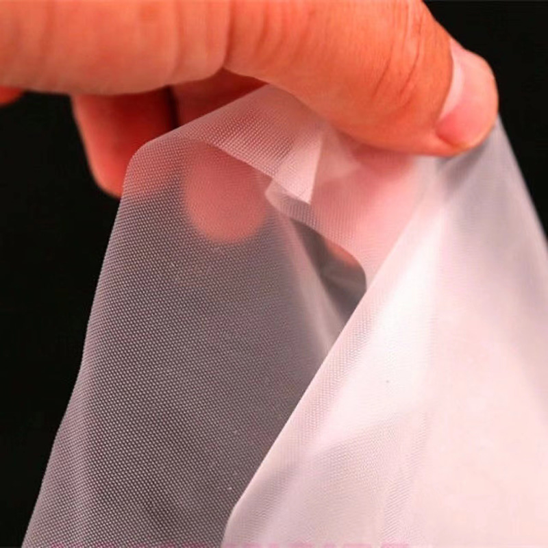 Găng tay CPE trắng nhạt chống dầu và nước Găng tay CPE trắng nhạt chống dầu và nước